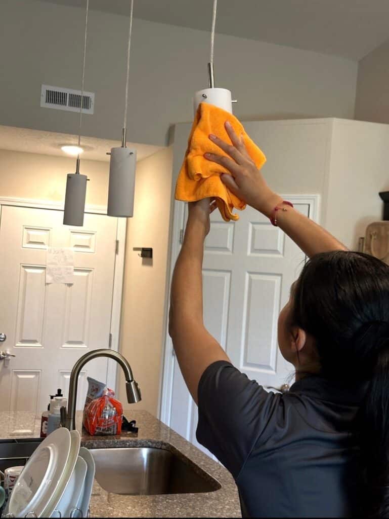 workers providing residential cleaning services in home